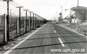 guarded border with barbed wire and tall fences