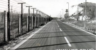 guarded border with barbed wire and tall fences
