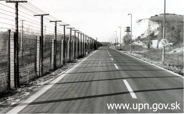 guarded border with barbed wire and tall fences